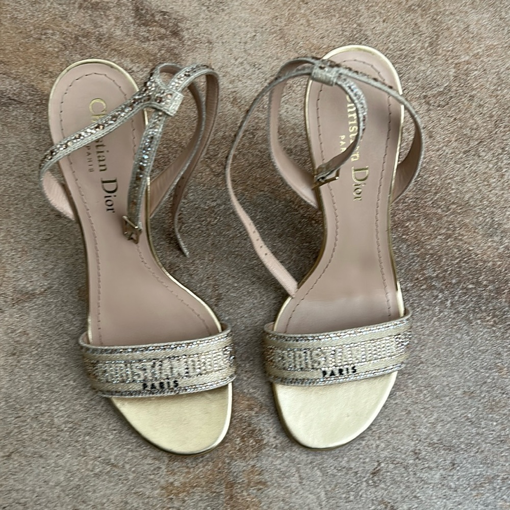Christian Dior gold heels.